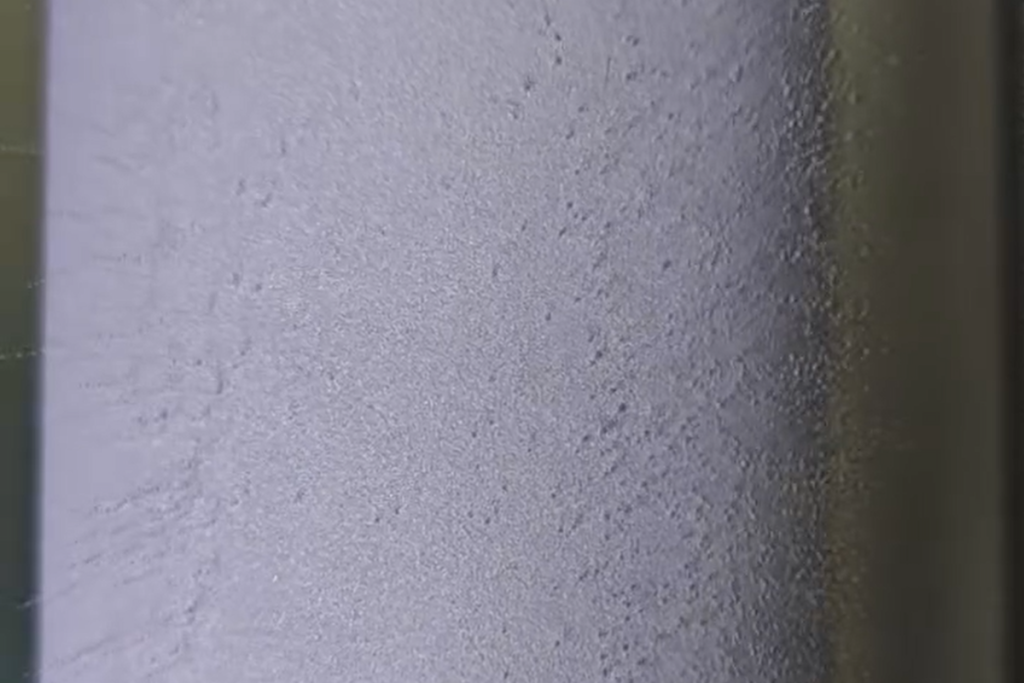 CMI Filtration technician performing bubble point test on sintered metal filter element.